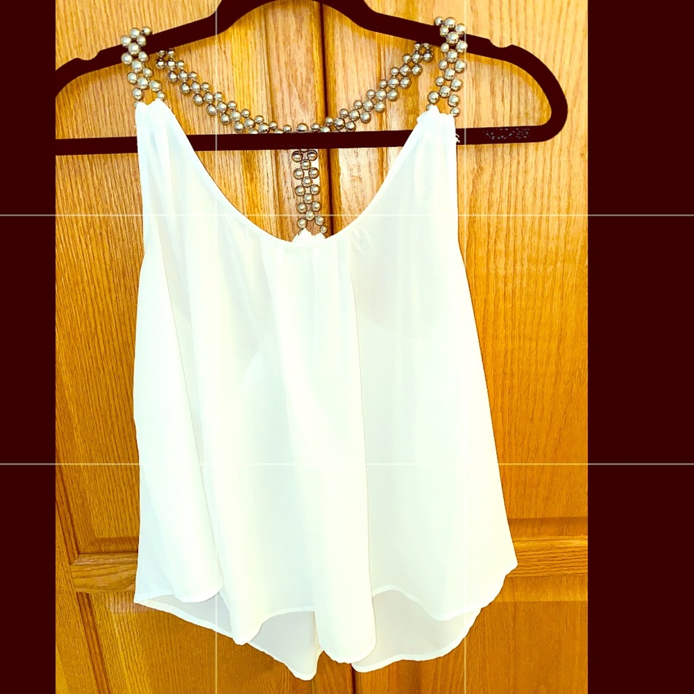 White blouse with silver design